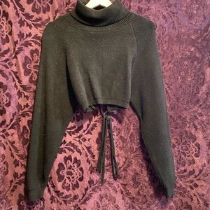 Black turtleneck open back knit sweater